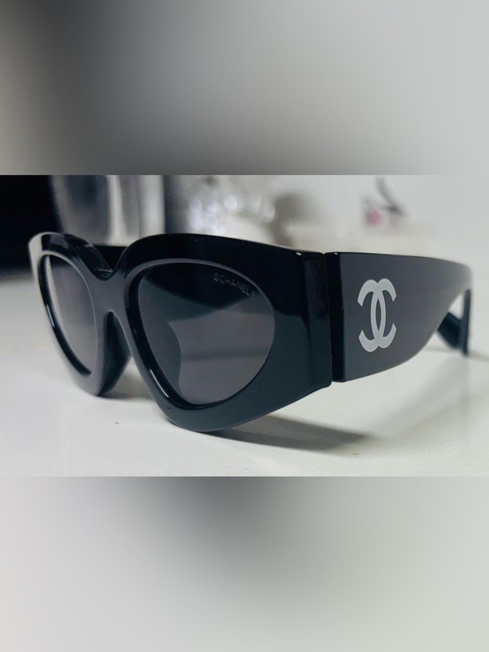 CHANEL Black Cat-Eye Sunglasses with Dark Lenses